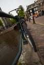 Vintage bike parked on a bridge in Amsterdam Royalty Free Stock Photo