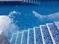 Top view of blue swimming pool stairs. Royalty Free Stock Photo