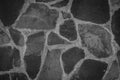 Abstract traditional stone wall pavement texture background. Bumpy textured stonewall made from flagstone and slabstone Royalty Free Stock Photo