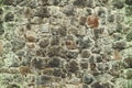 Abstract traditional stone wall pavement texture background. Bumpy textured stonewall made from flagstone and slabstone Royalty Free Stock Photo