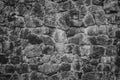 Abstract traditional stone wall pavement texture background. Bumpy textured stonewall made from flagstone and slabstone Royalty Free Stock Photo