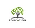 Abstract tree and book education logo design template. Royalty Free Stock Photo