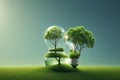 abstract Tree growing in light bulb on grass or meadow. conceptual design in environment