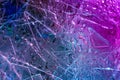 Background in the style of the 80-90s. Real texture of broken glass and drops in bright acid colors.