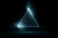 Abstract triangle shape made of glowing particles Royalty Free Stock Photo