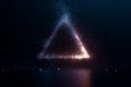 Abstract triangle shape made of glowing particles Royalty Free Stock Photo