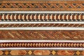 Abstract tribal pattern on wood background