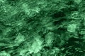 Abstract underwater wallpaper. Aquatic ripple wavy green water surface, water texture background
