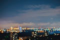 Abstract urban night. City at night with light bokeh against sky with clouds, blurred focus, twilight time, for Royalty Free Stock Photo