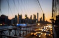 Abstract urban night light bokeh defocused Brooklyn Bridge at twilight in New York Citynight Royalty Free Stock Photo