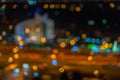 Abstract urban night, round building or stadium at night with light bokeh, blurred focus, twilight time, for background Royalty Free Stock Photo