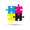 Abstract vector logo, four puzzle pieces in cmyk colors