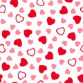 Abstract vector seamless pattern with cute textural red and pink hearts on isolated white Royalty Free Stock Photo