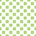 Abstract vector seamless pattern mosaic of green four leaf clover in diagonal arrangement on white background. Saint Royalty Free Stock Photo