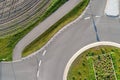 Abstract vertical aerial view of a cut roundabout next to an area of arable land Royalty Free Stock Photo