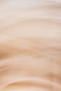 Abstract vertical beige brown background of horizontal waves