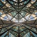 Abstract view of a geometric structure with multiple reflective glass panels, creating Royalty Free Stock Photo