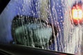 Abstract View from Inside a Car Being Washed - Water, Soap, etc. on a Car Window