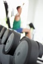 Abstract View Of Man Training With Weights In Gym