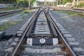 Abstract view of railway arrows. A turnout switch for rails in railway traffic. Rails, sleepers and crushed stone on the railway Royalty Free Stock Photo