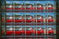 Abstract View of a Red Car seen through a Glass Brick. Royalty Free Stock Photo