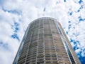 Abstract view on residential apartment complex building with many balconies and floors isolated against blue sky on sunny day Royalty Free Stock Photo