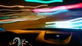 View from the window of a car driving fast along the  street of a night city. Royalty Free Stock Photo