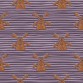 Abstract village seamless pattern with brown windmill doodle print. Purple striped background