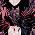 Abstract vintage seamless tropical pattern with colorful pink blue leaves and on black background. Royalty Free Stock Photo