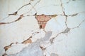 Abstract vintage texture and background of crack and broken plastered cement surface on the brickwork wall