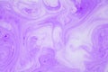 Abstract violet marble background. Stains of paint on the water.