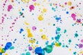 Abstract vivid watercolor splashes, drops on white paper Royalty Free Stock Photo