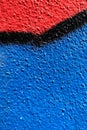 Abstract wall surface with part of graffiti. Geometric lines, light blue, black, red colors background Royalty Free Stock Photo