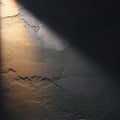 Abstract Wall Texture with Light and Shadow Creating Dramatic Effects Royalty Free Stock Photo