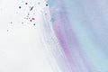 Abstract wallpaper with violet and blue watercolor strokes and splatters