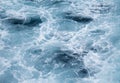 Abstract water background. Cruise ship tail in the blue sea. Royalty Free Stock Photo