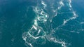 Abstract water currents, rapids and whirlpools in ocean.