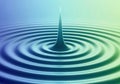 Abstract water drop creating concentric ripples on a blue and green gradient background Royalty Free Stock Photo