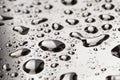 Abstract water drops on polished stainless steel surface Royalty Free Stock Photo