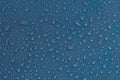 Abstract water drops texture. Wet raindrops on glass blue background. Bubble pattern. Royalty Free Stock Photo