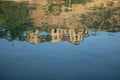 Abstract water reflection of building on water surface in the pond at the city. Royalty Free Stock Photo