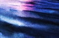 Abstract watercolor background. Blue water ripples of light and dark shades reflecting glare of pink sunset sky. Blurred Royalty Free Stock Photo