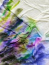 Abstract watercolor hand painted background. Multicolor stain of paint on a white napkin Royalty Free Stock Photo