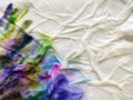 Abstract watercolor hand painted background. Multicolor stain of paint on a white napkin Royalty Free Stock Photo