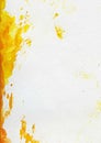 Abstract watercolor painted background with orange and yellow paint spots on textured paper