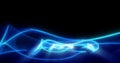 Abstract waves of blue energy magic smoke and glowing lines on a black Royalty Free Stock Photo