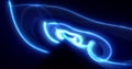 Abstract waves of blue energy magic smoke and glowing lines on a black Royalty Free Stock Photo