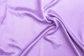 Abstract waving purple satin fabric background Royalty Free Stock Photo