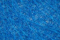 Abstract weave from a thin cord of blue color. Background