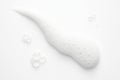 Abstract white bath foam diagonal ribbon of fine bubbles with airy texture and soft gloss on white Royalty Free Stock Photo